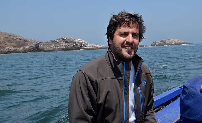Matias Caillaux in a rowboat